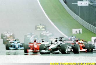 hakkinen leads into the first corner