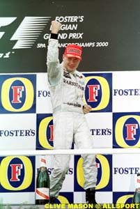 Mika Hakkinen on the podium in Belgium