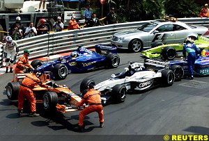 Cleaning up wreckage of a multi-car pile up