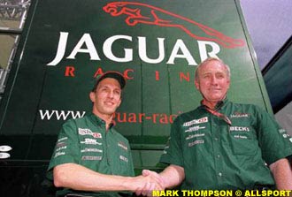 Luciano Burti shakes Neil Ressler's hand at the Italian GP this year