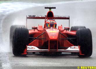 Rubens Barrichello masters the wet