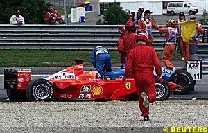Michael Schumacher's damaged car at the first corner in Austria