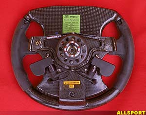 Clutch and gear paddles on the back of the steering wheel