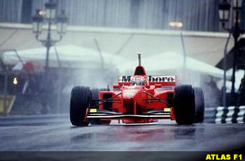 Eddie Irvine on a moist Monaco track