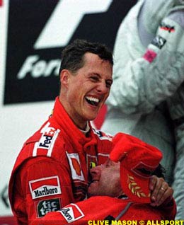 Schumacher and Todt celebrate the 2000 title