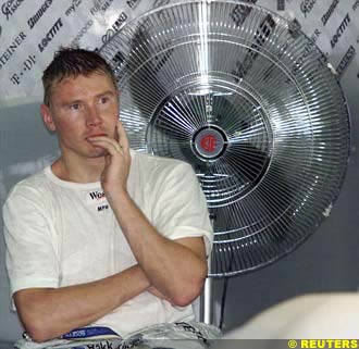Hakkinen tries to cool off in Malaysia
