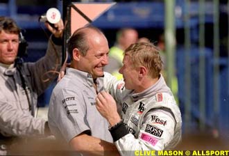 with McLaren team chief Ron Dennis