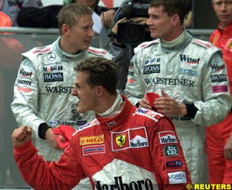 Schumacher ahead of the McLaren boys