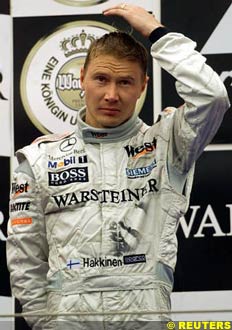 Mika Hakkinen on the podium