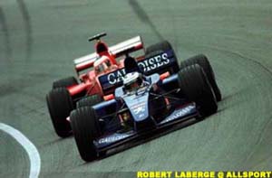 Barrichello slipstreaming Alesi in the banked section