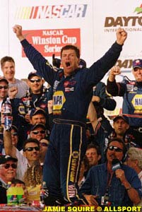 Michael Waltrip celebrates victory at the Daytona 500
