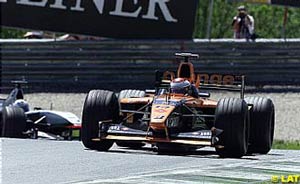 Jos Verstappen infront of David Coulthard