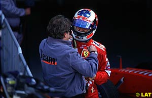 Michael Schumacher chatting with Norbert Haug, head of Mercedes Motorsport.