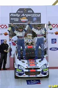 Colin McRae, right, and co-driver Nicky Grist celebrate victory in Argentina
