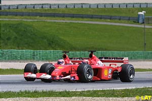 Schumacher passes Barrichello at the A1-Ring