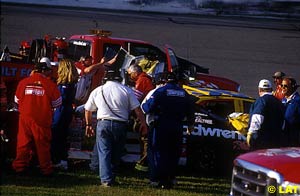 Crews work to free Earnhardt from his mangled car at the end of the 2001 Daytona 500