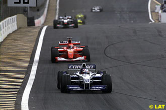 Montoya leads from Schumacher and Coulthard