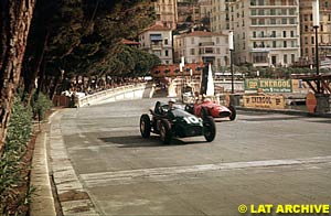 Stuart Lewis-Evans (Connaught B-Alta) leads Carlos Menditeguy (Maserati 250F) at the 1957 Monaco Grand Prix. Lewis-Evans finished in 4th position in his Grand Prix debut