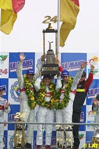 The winning Audi team on the podium
