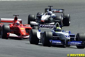 Ralf Schumacher ahead of Michael Schumacher and David Coulthard
