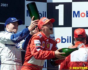 Michael Schumacher and Ralf Schumacher on the podium