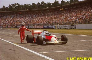 Prost pushes his car to the finish, 1986