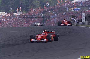 Michael Schumacher followed by Rubens Barrichello and David Coulthard  