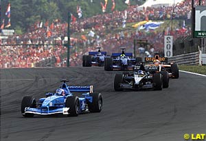 Jenson Button followed by Fernando Alonso and Enrique Bernoldi  