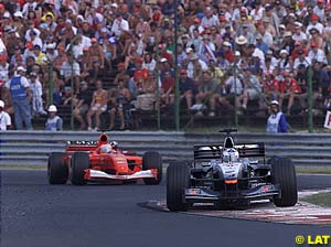 David Coulthard leads Rubens Barrichello  