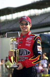 Jeff Gordon holds the Brickyard 400 trophy