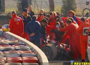 Luca Badoer being lifted out of his Ferrari at Barcelona, january 21st
