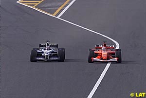 Montoya and Barrichello fight for second place
