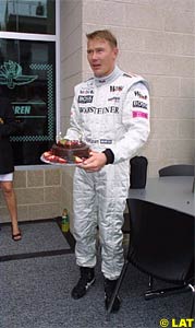 Mika Hakkinen with his birthday cake