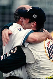 Rahal hugs his then driver, Max Papis, at the 1999 Surfers Paradise race