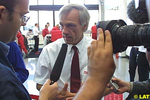 Gustav Brunner talks to journalists at the factory