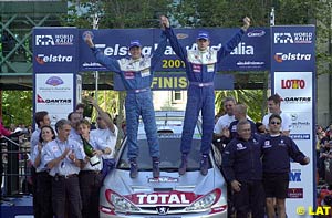 Marcus Gronholm and Timo Rautiainen celebrate their Rally Australia victory