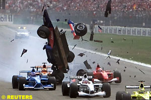 Burti crashes into the back of Schumacher