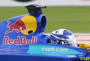 Kimi Raikkonen in the Red-Bull sponsored Sauber C20 