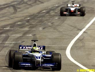 Ralf Schumacher, Williams, followed by David Coulthard, McLaren.