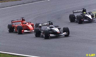 David Coulthard having just passed Michael Schumacher at the 2001 Brazilian GP