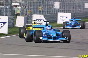 Jenson Button followed by Jean Alesi and Giancarlo Fisichella  