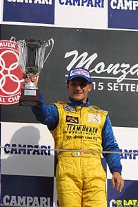 Winner Giorgio Pantano with the winner's trophy