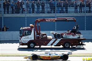 Kenny Brack passes Zanardi's wrecked car