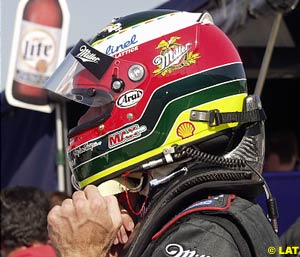 Max Papis wearing the HANS device