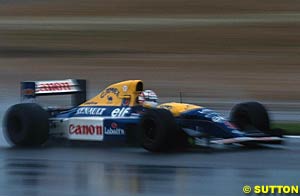 Mansell excels in the wet in Spain