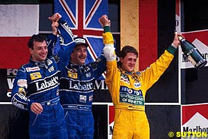 Mansell with Schumacher on the podium