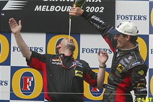Minardi boss Paul Stoddart and Mark Webber