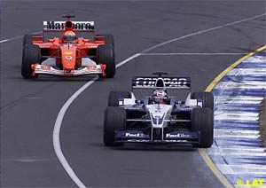 Juan Pablo Montoya followed by Michael Schumacher