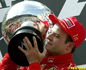 'Winner' Rubens Barrichello on the podium in Austria