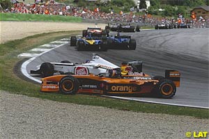 Villeneuve pushes Frenzen off the track